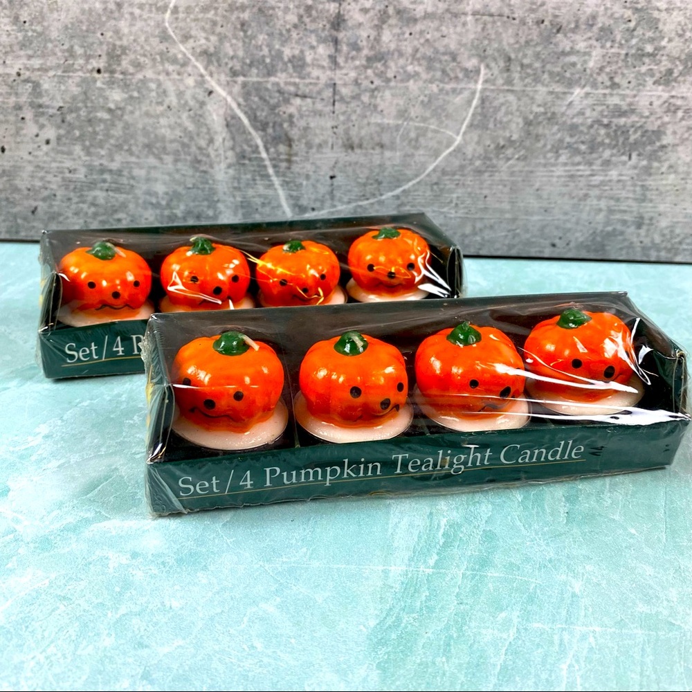 New in package 8 Jack-o-lantern tealights orange